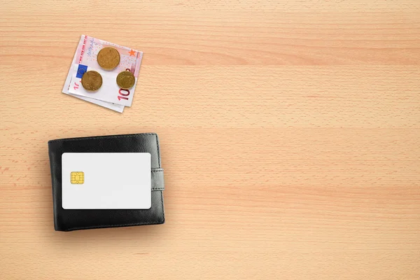 Wallet, money and credit card mock-up on desk