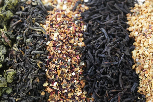Different varieties of dry tea (black, white, green)