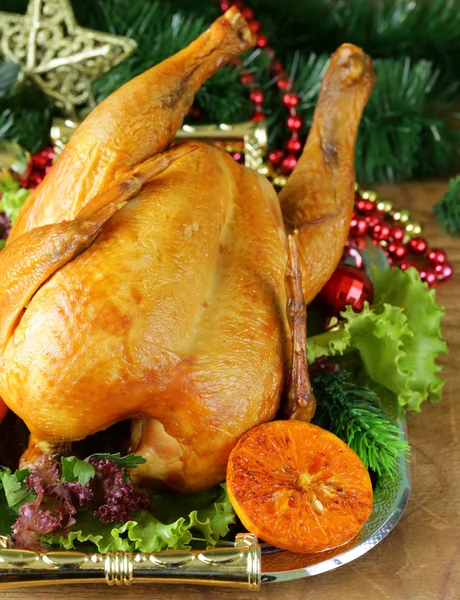 Baked chicken for festive dinner, Christmas table setting