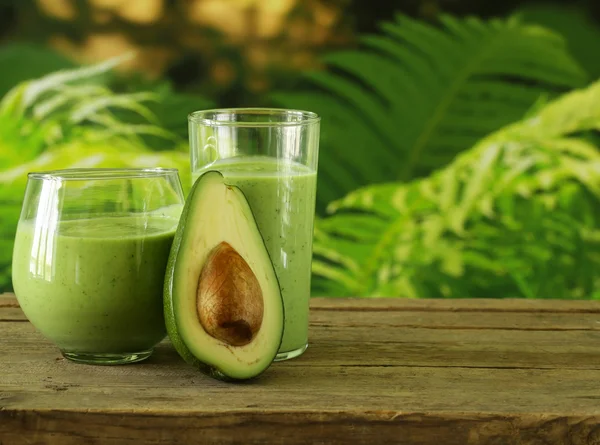 Natural drink smoothie with avocado, herbs and yogurt