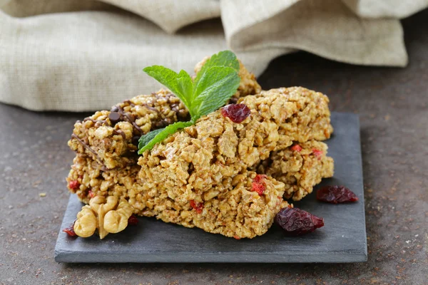 Homemade muesli bars with cranberries, nuts and chocolate