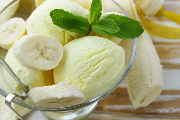Fruit ice cream with fresh banana and mint