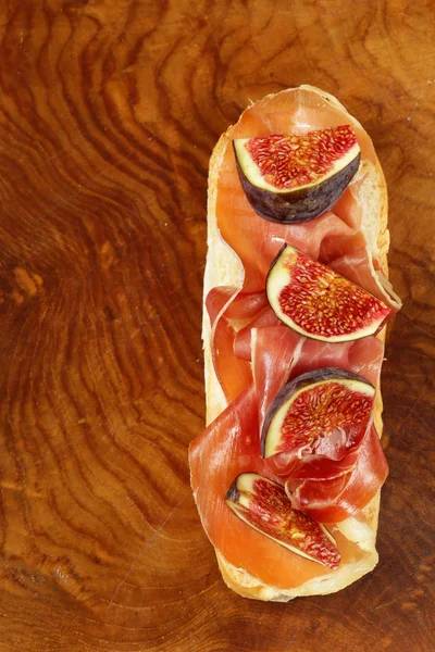 Gourmet sandwich with smoked ham (Parma) and sweet figs