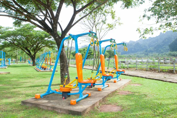 Exercise equipment in public park in the morning at Thailand