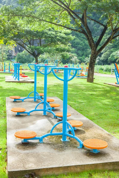 Exercise equipment in public park in the morning at Thailand