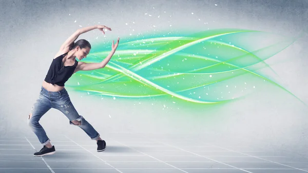 Hip hop dancer posing with green lines