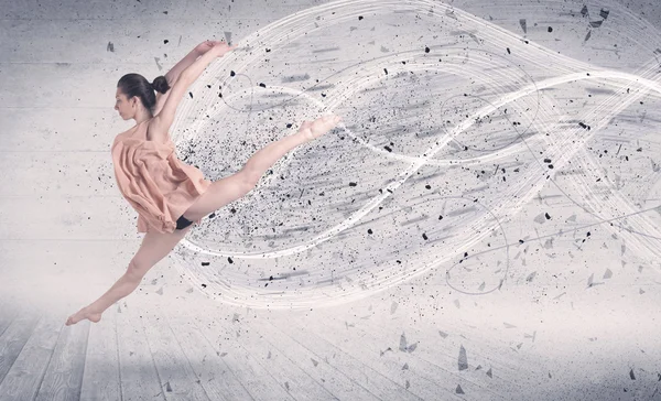 Performance ballet dancer jumping with energy explosion particle
