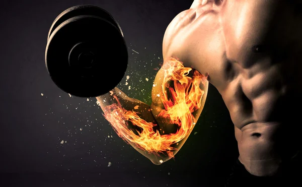 Bodybuilder athlete lifting weight with fire explode arm concept