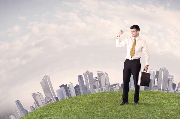 Man standing in front of city landscape