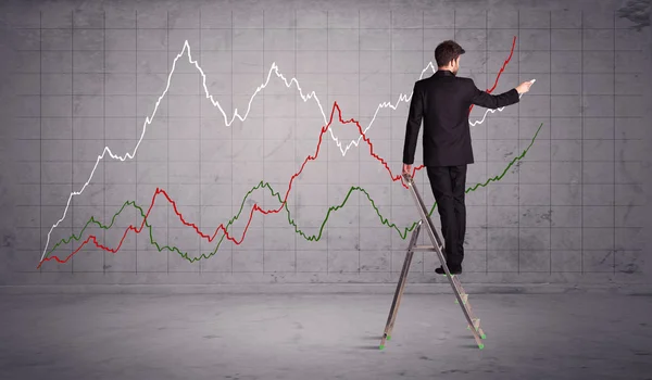 Male on ladder drawing chart lines