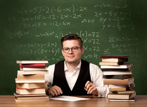 Math teacher at desk