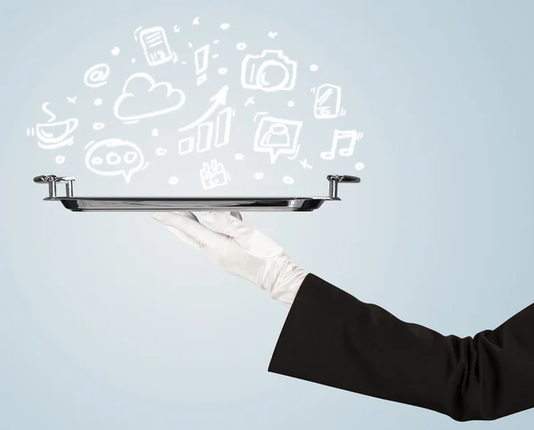 服务员拿着托盘与媒体图标 - 图库照片ra2stud