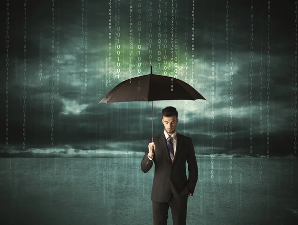 Business man standing with umbrella data protection concept