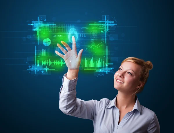 Young businesswoman pressing modern technology panel with finger