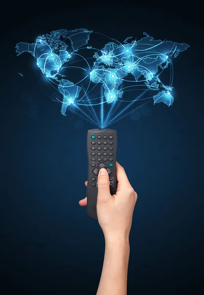 Hand with remote control, social media concept