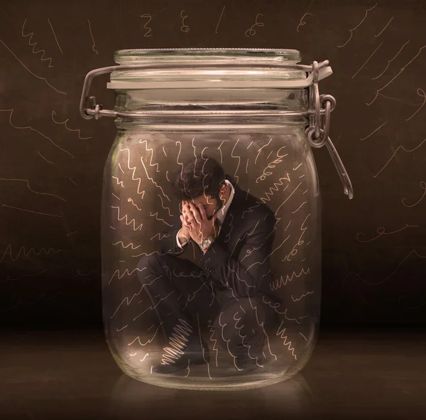 Businessman inside a jar with powerful hand drawn lines concept