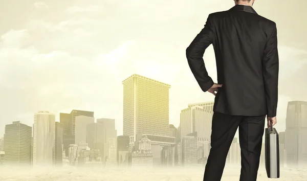 Businessman with city view