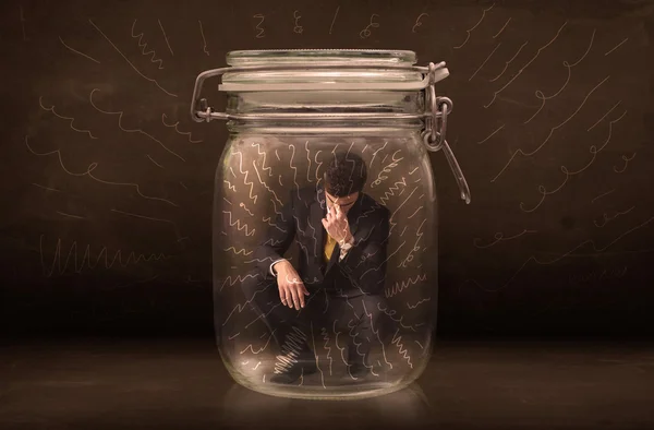 Businessman inside a jar with powerful hand drawn lines concept
