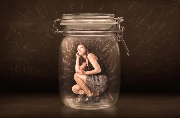Businesswoman inside a jar with powerful hand drawn lines concep