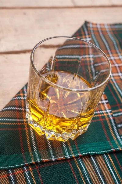 Scotch whisky on tartan