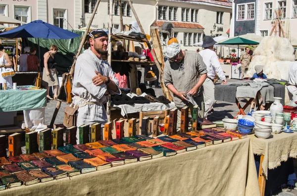 Master crafts sell their products on the medieval market