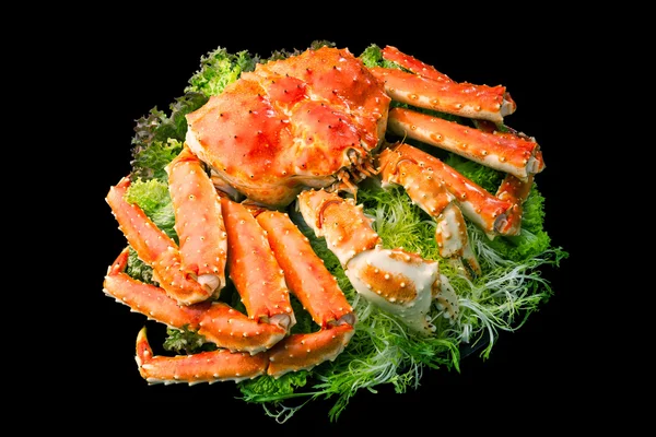 Red king crab served on big plate