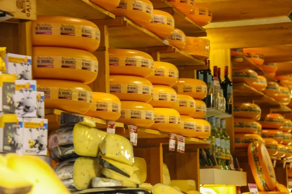 Shelves with famous Dutch cheese in the traditional cheese shop