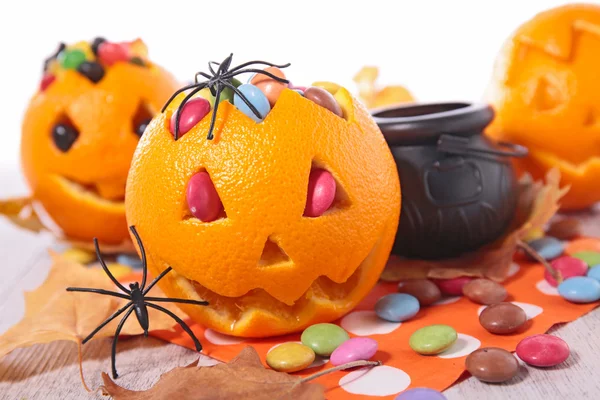 Halloween oranges and candies
