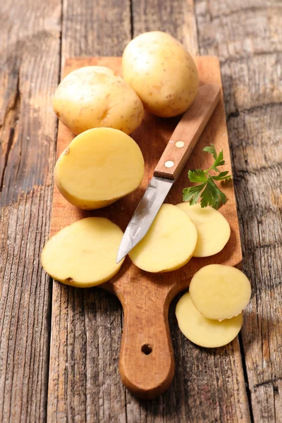 Sliced raw potatoes
