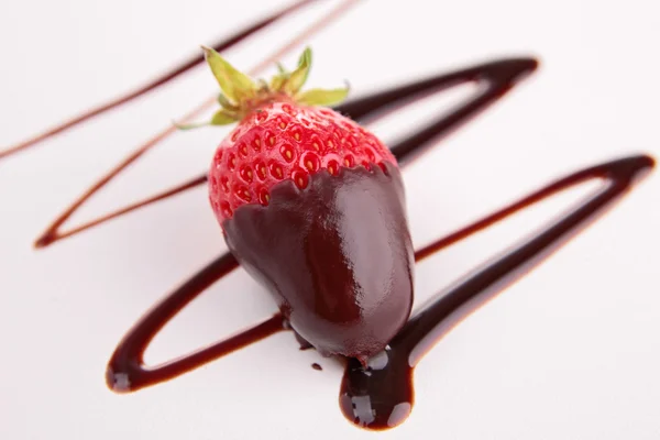 Strawberry in chocolate sauce
