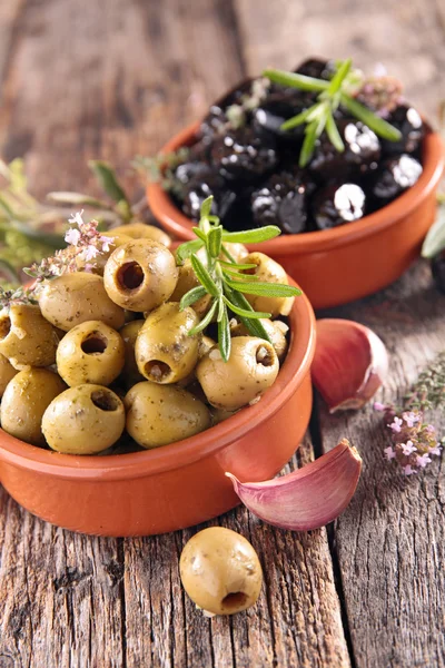 Black and green olives with rosemary