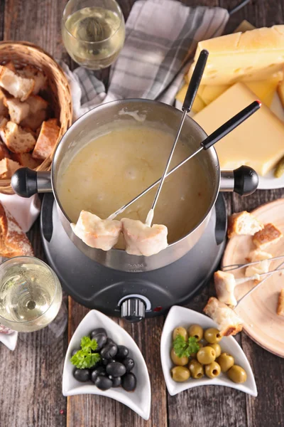 Cheese fondue in metal pan