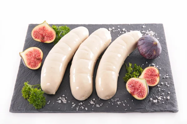 White sausages with figs