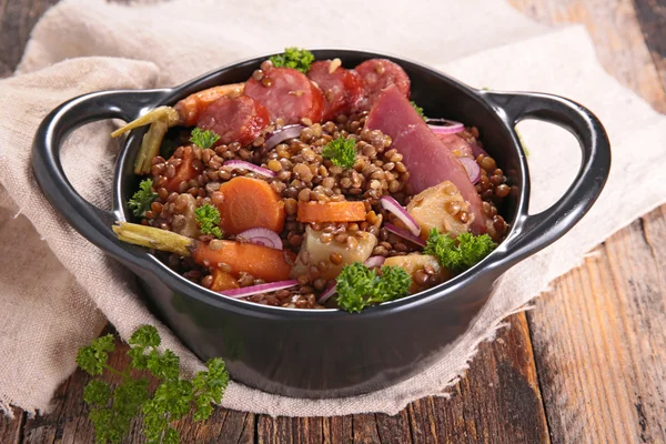 Lentils with vegetables and meat