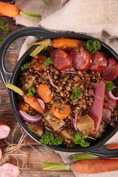 Lentils with vegetables and meat