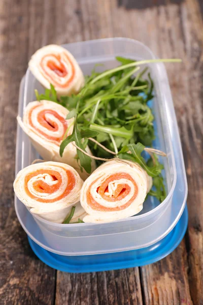 Lunch box with salmon wraps