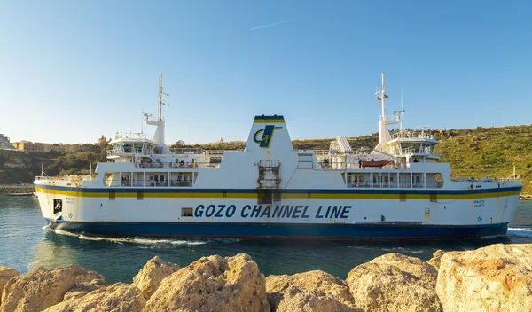Mgarr, MALTA - APRIL 16: Ferry crosses the Gozo channel in Mgarr, Malta on  APRIL 16, 2015. The Gozo Channel Line operates the crossing between the two islands of Malta and Gozo.