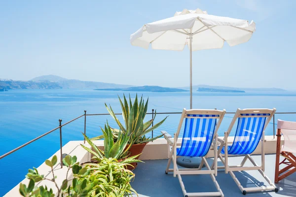 Deck chairs on the terrace with sea view