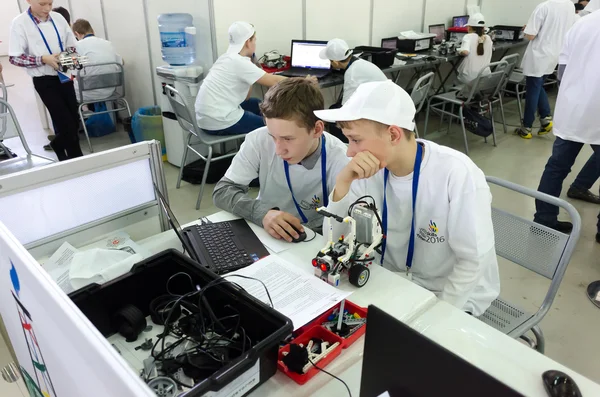School students program the robot. Tyumen. Russia