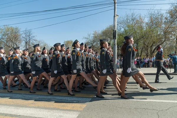 Women-cadets of police academy marching on parade