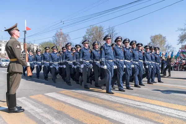Company of traffic police officers march on parade