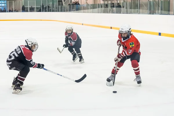 Game of children ice-hockey teams