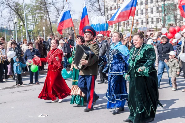 Cossack with women sings songs on procession