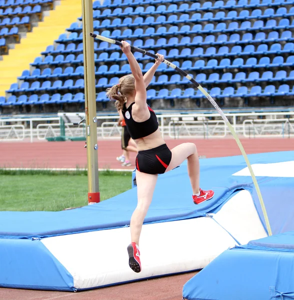 Lobanova Ekaterina from Belarus competes in pole vault competition on the international youth athletic