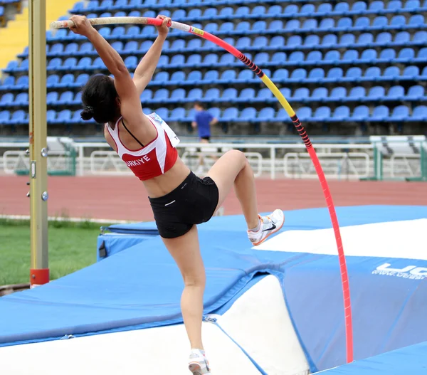 Parlak Demet from Turkey competes in pole vault competition for girls