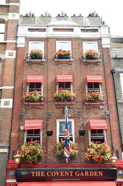 Covent Garden Pub with Flower Baskets