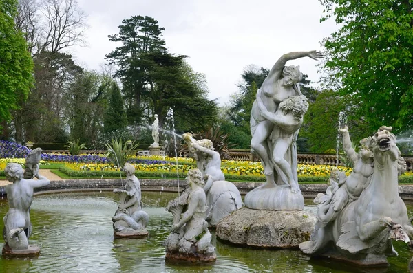 Ornate statues in fountain of stately home