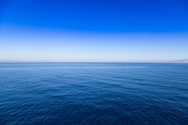 Blue sea and sky horizon background, day shot