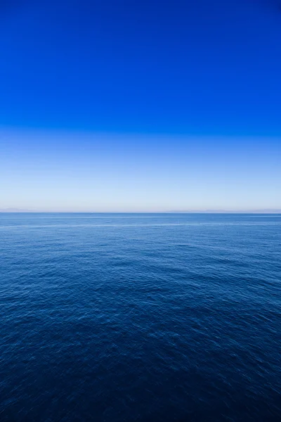 Blue sea and sky horizon background, day shot