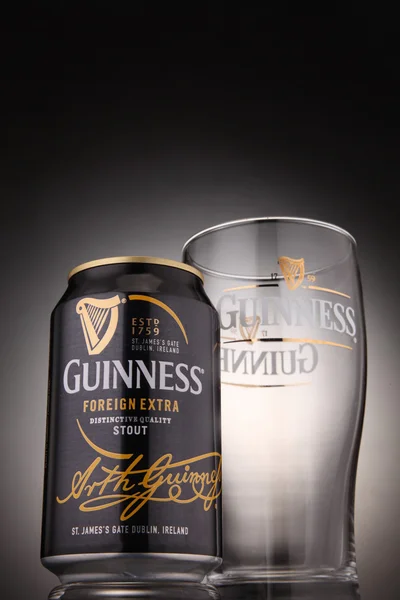 Guinness Stout can and glass
